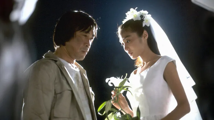 武田鐵矢（左）和淺野溫子主演的《101次求婚》轟動90年代。劇照