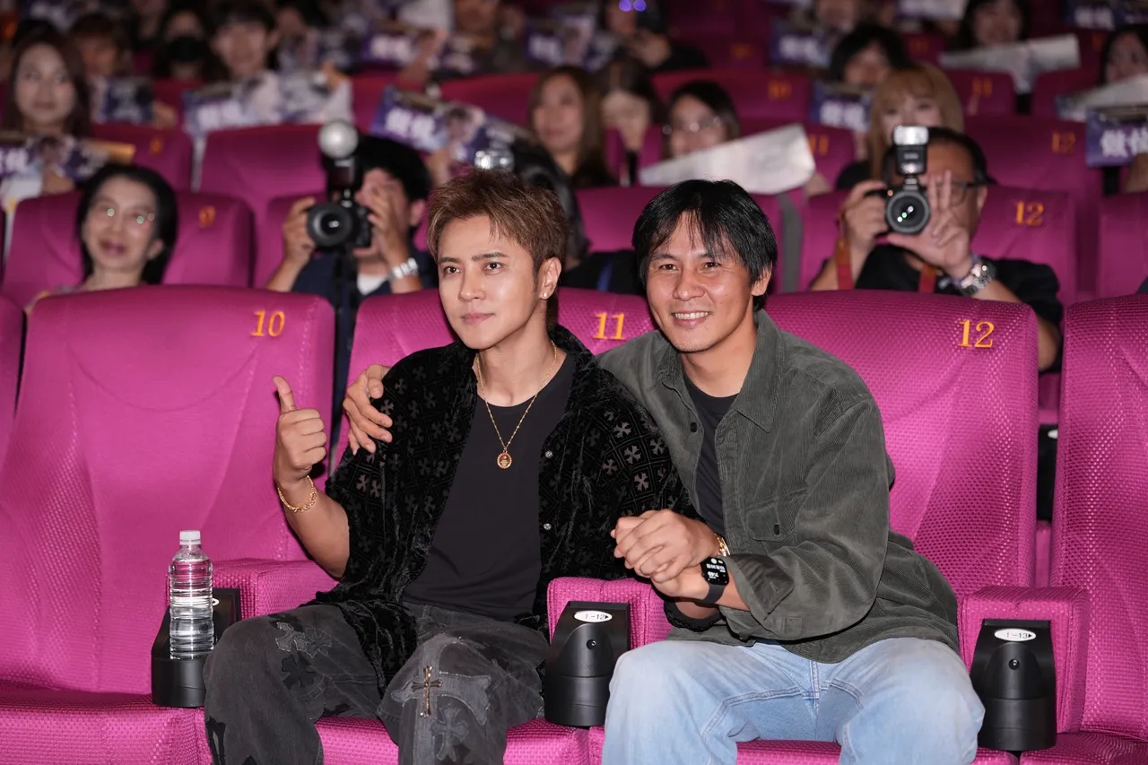 小猪(左)与MV导演邬鹤宏。彭欣伟摄