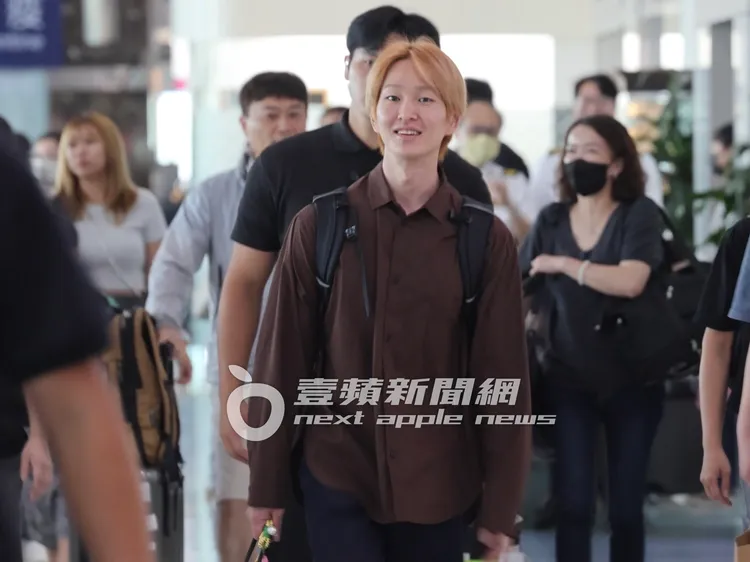 溫流看起來心情很好，臉上掛滿笑容。特勤中心攝