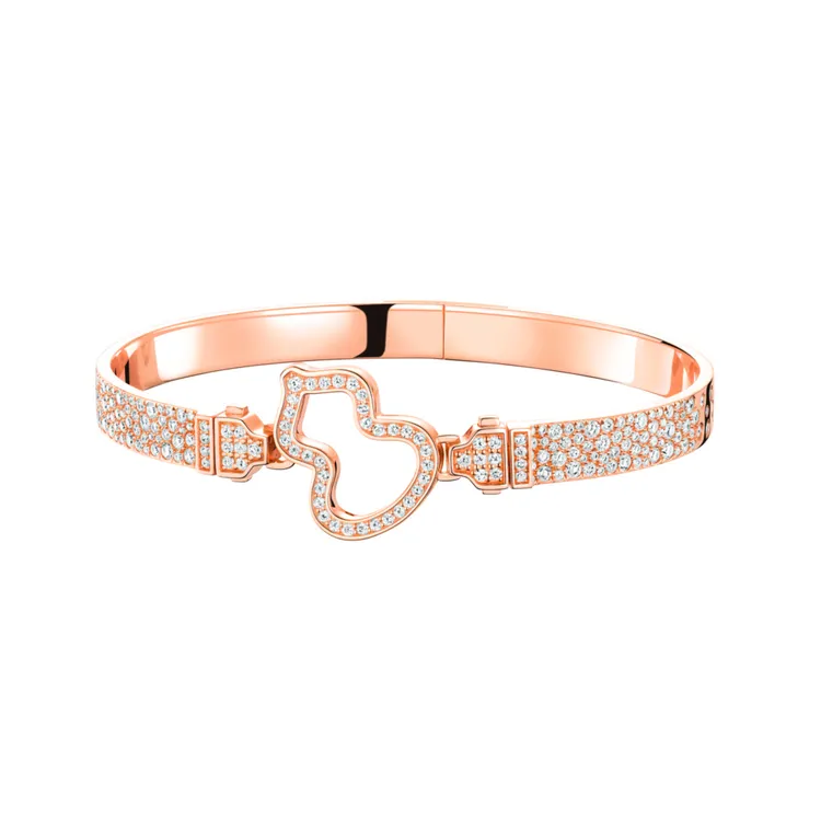 Qeelin Wulu 18K玫瑰金鑽石手帶扣子（不含手帶、手鍊、手鐲），13萬2000元。品牌提供