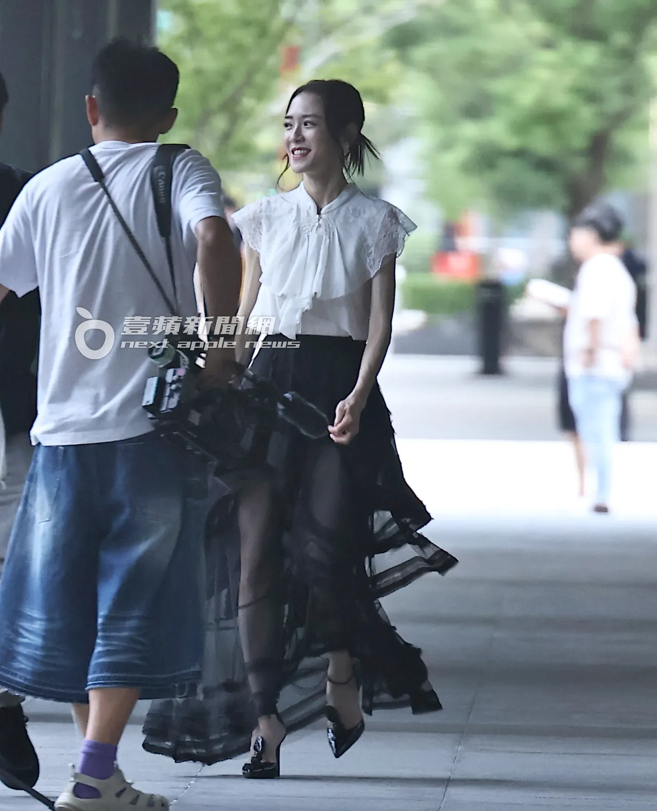 杨千霈一路上吸引不少路人回头。特勤中心摄