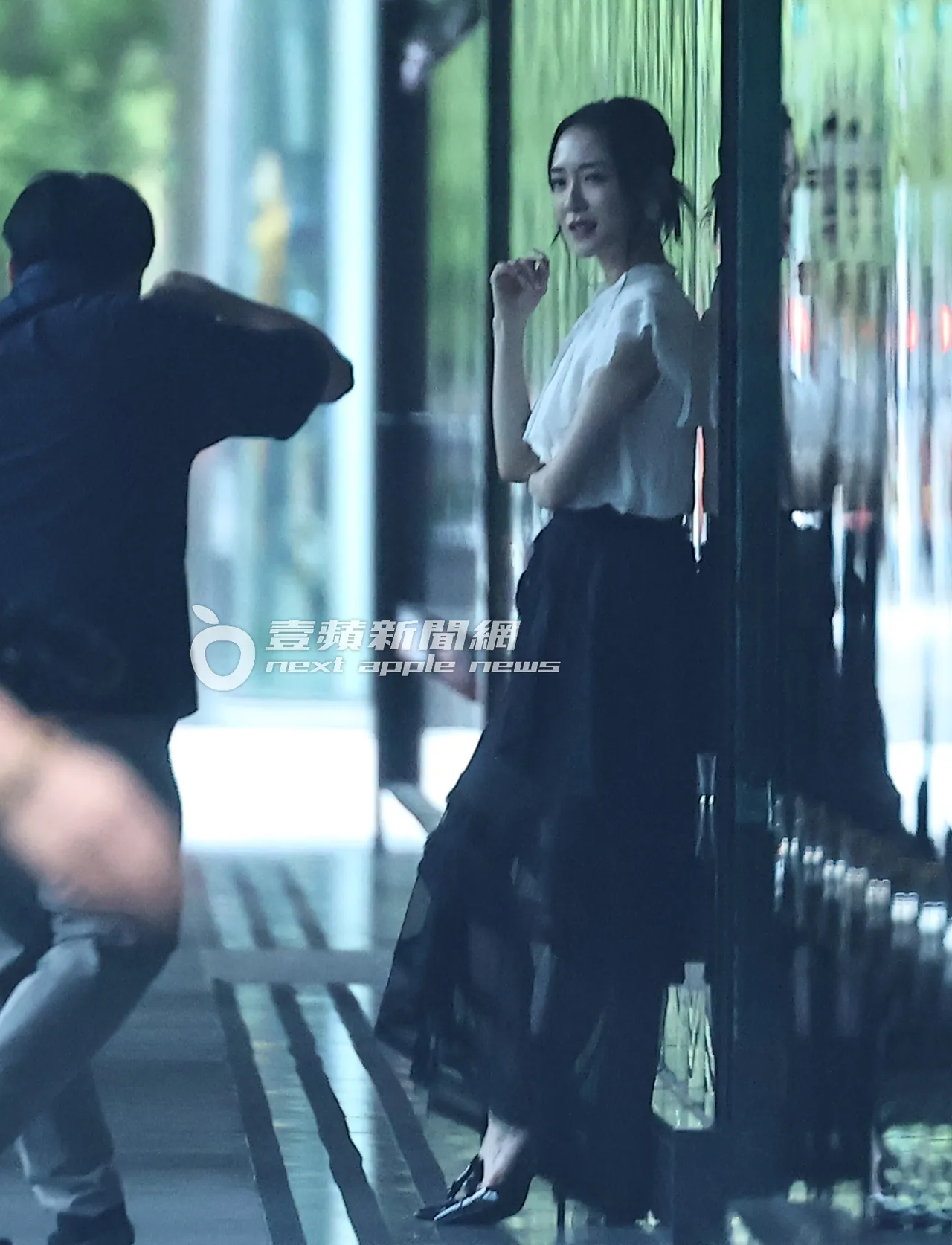 杨千霈专业地摆出拍照pose。特勤中心摄