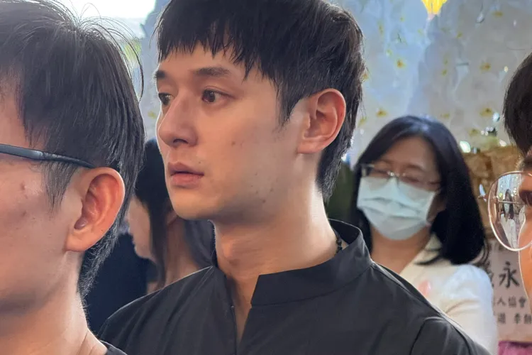 張軒睿神情哀傷。張瑞振攝