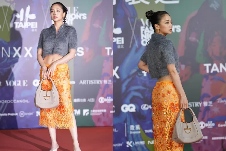 吳映潔在橘色亮片裙之中穿著同色系小褲褲，辣翻全場。彭欣偉攝