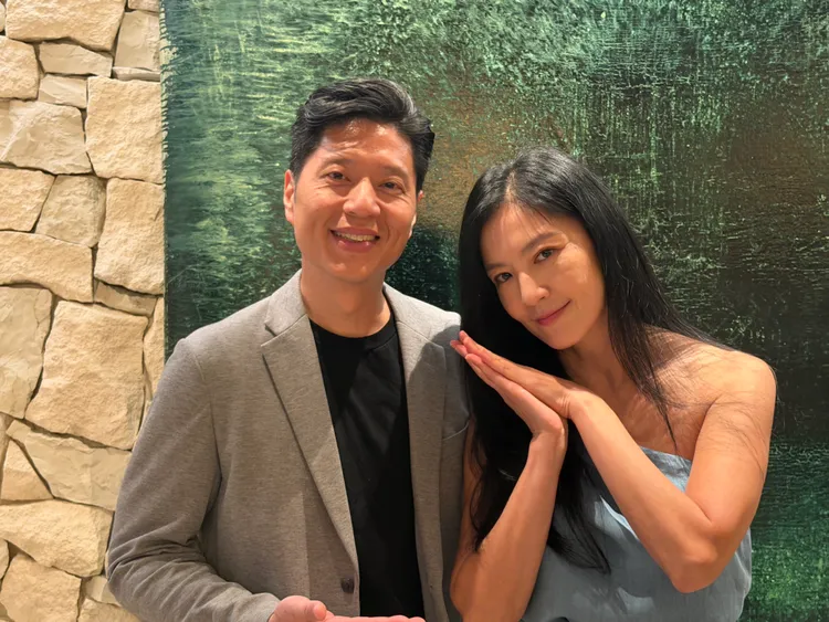 林熙蕾與游士德牧師。