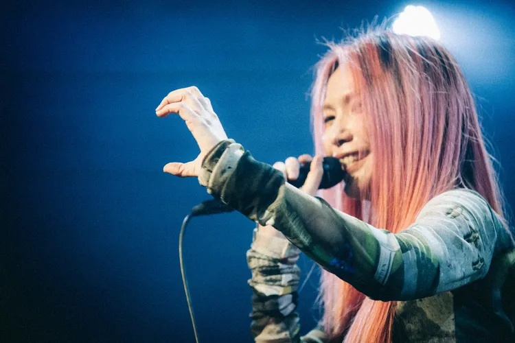 惠婷開心比愛心。相信音樂提供