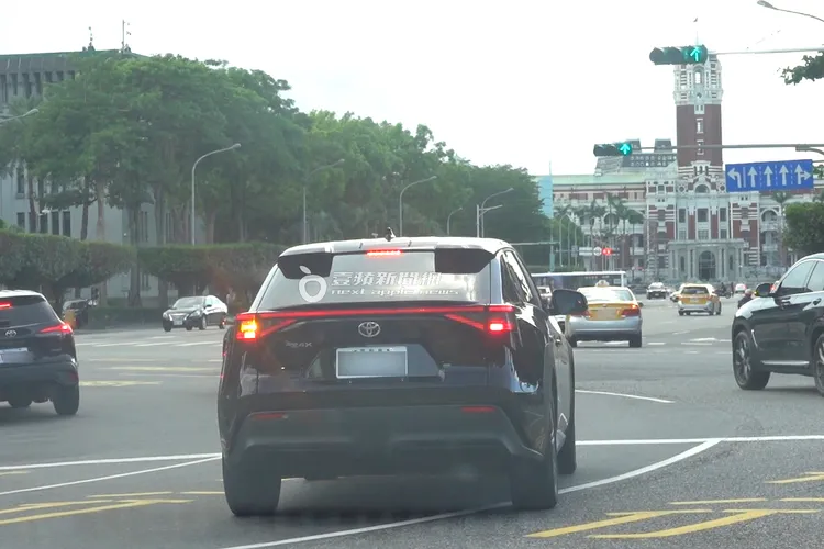 李洋跑行程由公務車接送。特勤中心攝