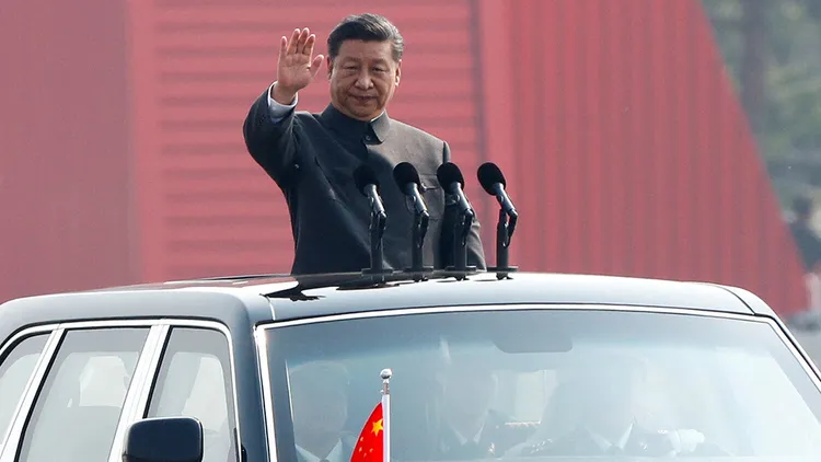 圖為中國國家主席習近平過去進行閱兵。資料照