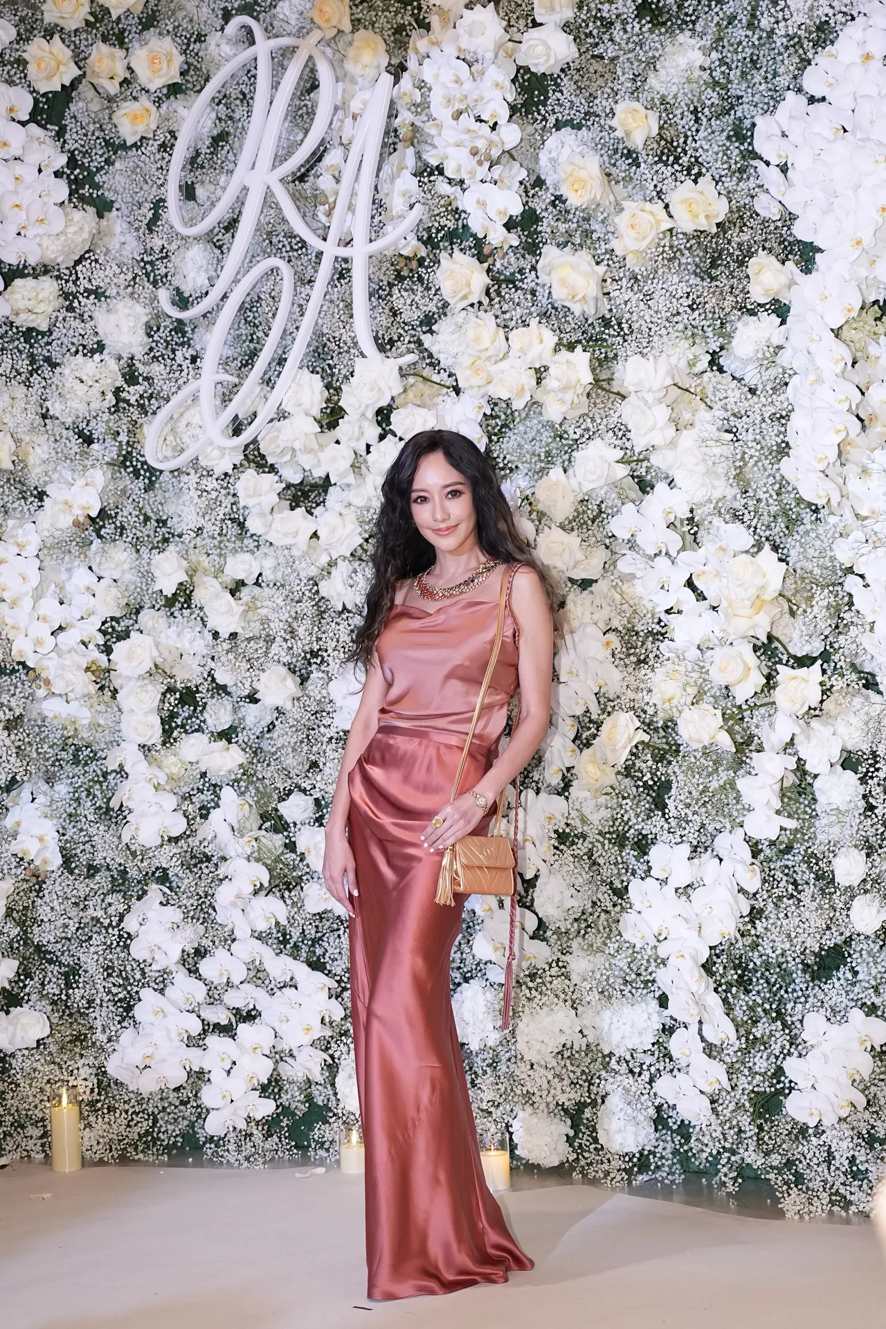 关颖今粉色洋装出席婚宴。彭欣伟摄