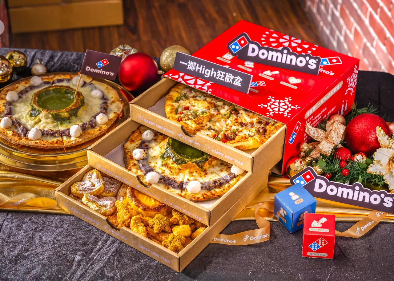 「一擲High狂歡盒」可同時裝下3款期間限定的披薩及副食，外盒還結合互動遊戲可變身成兩顆骰子。達美樂提供