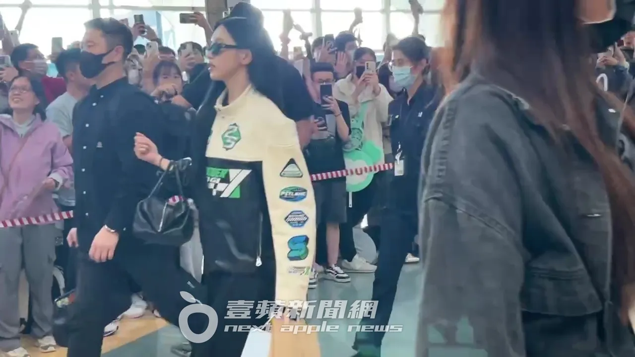 MINA戴上墨鏡，十分優雅。陳薇安攝