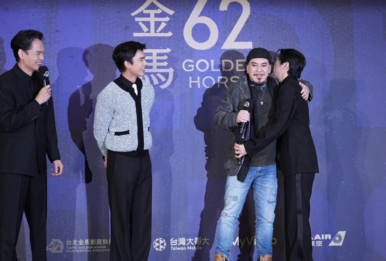 姚淳耀抱黄秋生。彭欣伟摄