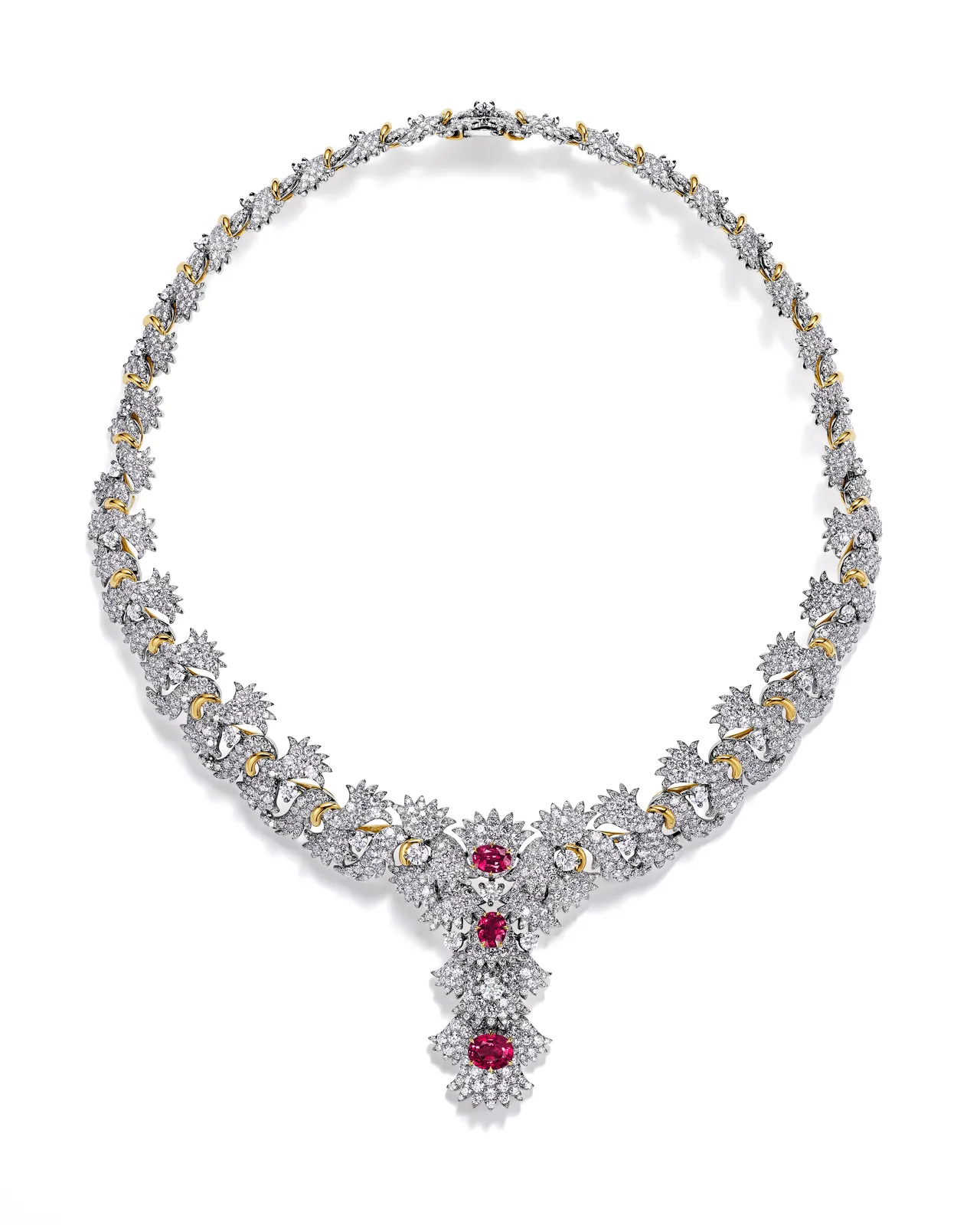 2025 Blue Book 高级珠宝 Sea of Wonder Anemone系列，铂金与黄K金镶嵌3颗逾4克拉未经优化处理的椭圆形切割红宝石及钻石项链。品牌提供