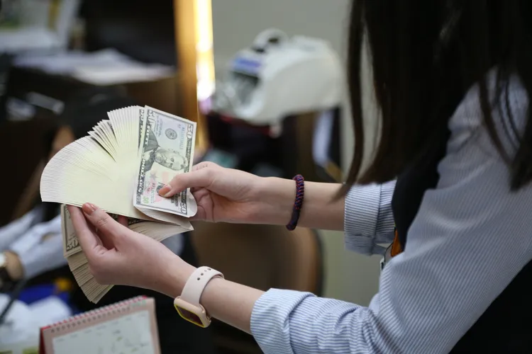 法人认为，美元霸权将逐渐削弱。示意图