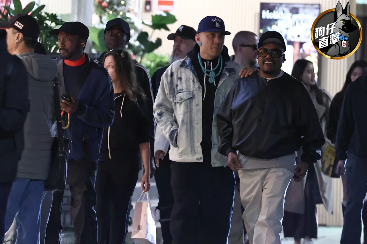嘻哈天團黑眼豆豆現身台北東區街頭。特勤中心攝