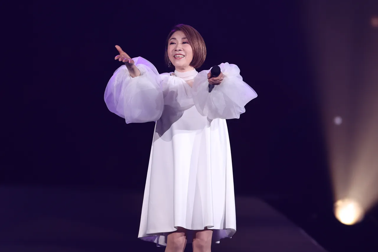 李翊君独唱《恰似你的温柔》、《海里来的沙》、《萍聚》。彭欣伟摄