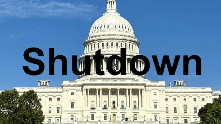 美国政府停摆进入第35天。合成画面。背景为美国国会。中央社