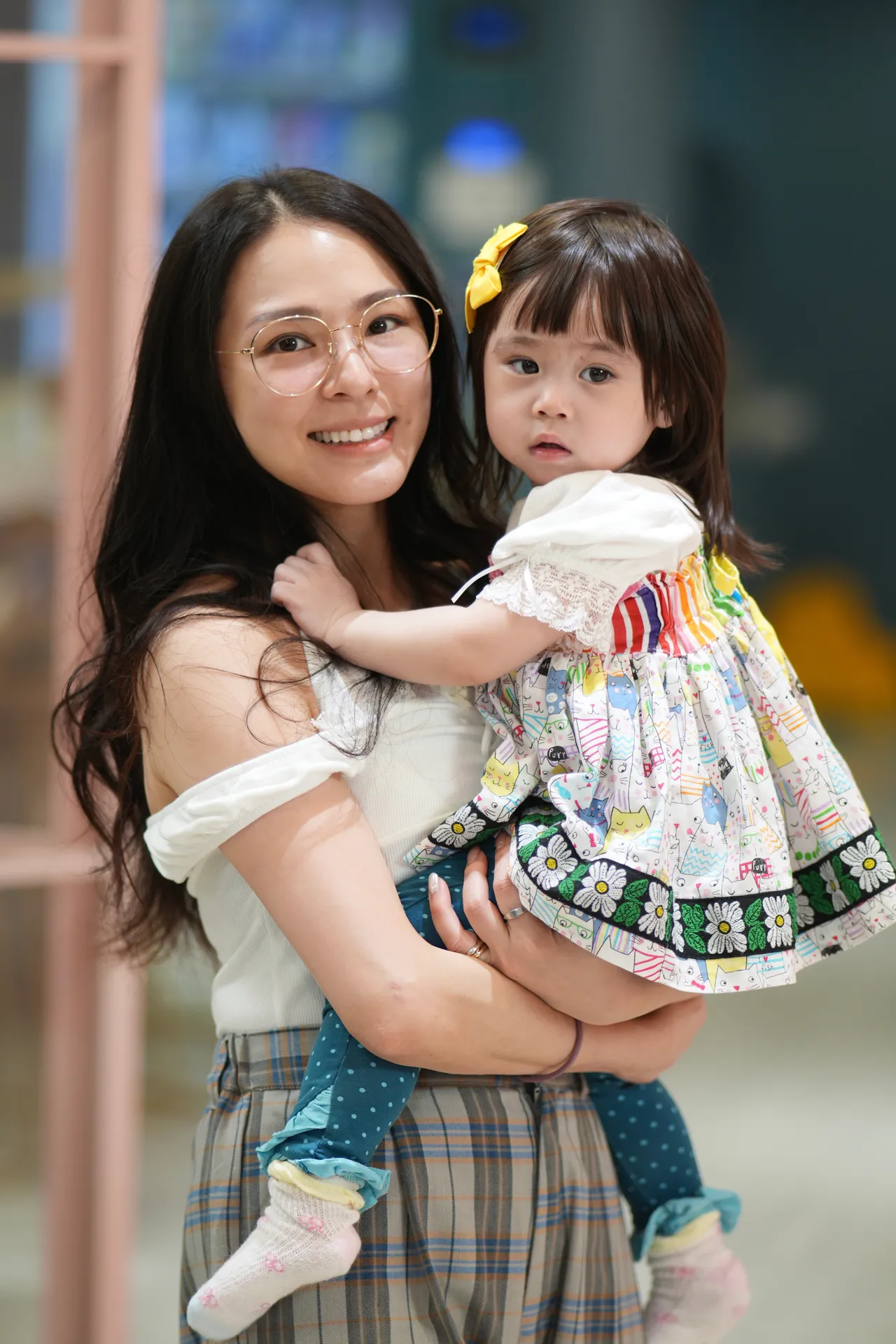 熊熊（左）带1岁多女儿出席。彭欣伟摄