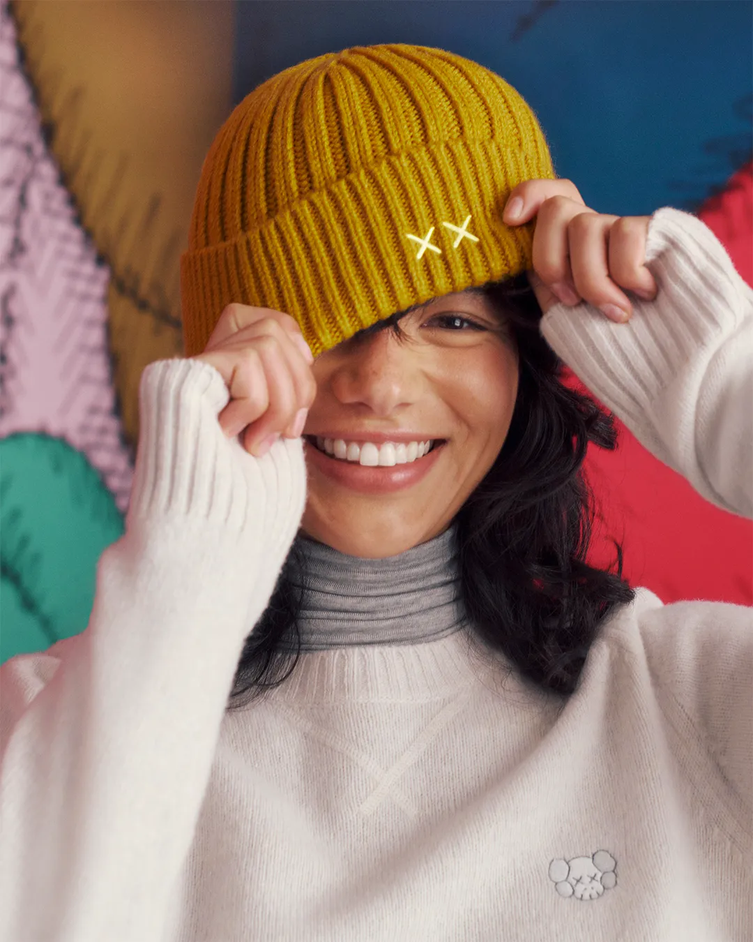 毛帽以「XX」設計符號點綴出俏皮感。品牌提供