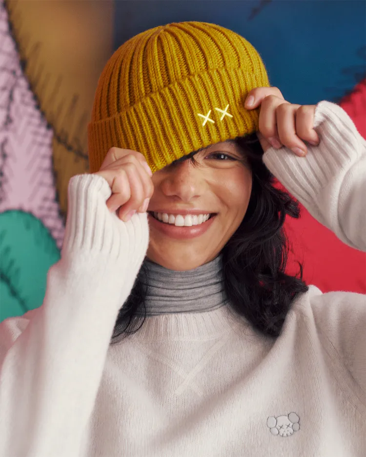 毛帽以「XX」設計符號點綴出俏皮感。品牌提供