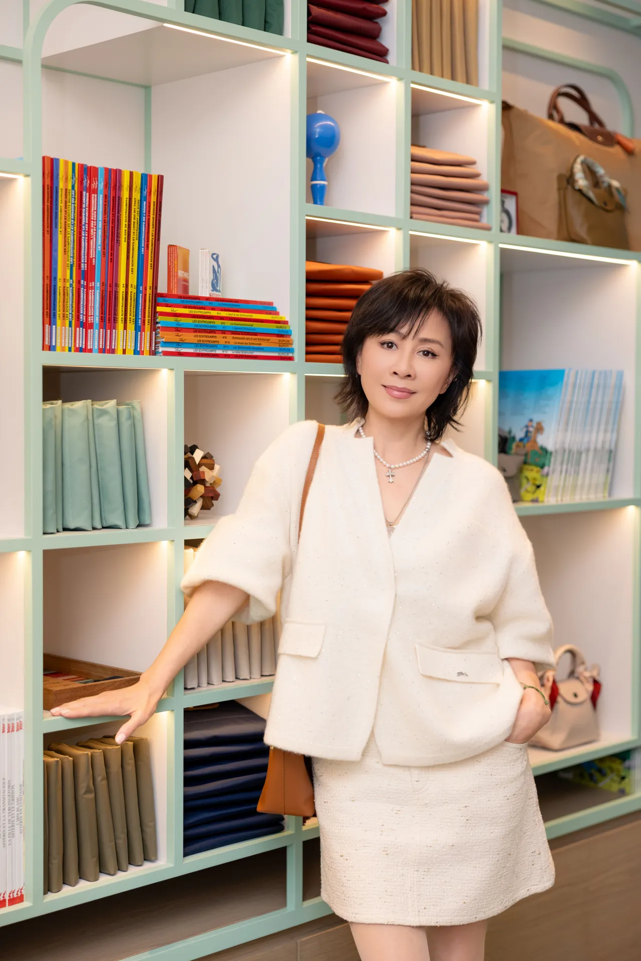 刘嘉玲以白色套装出席Longchamp活动。品牌提供