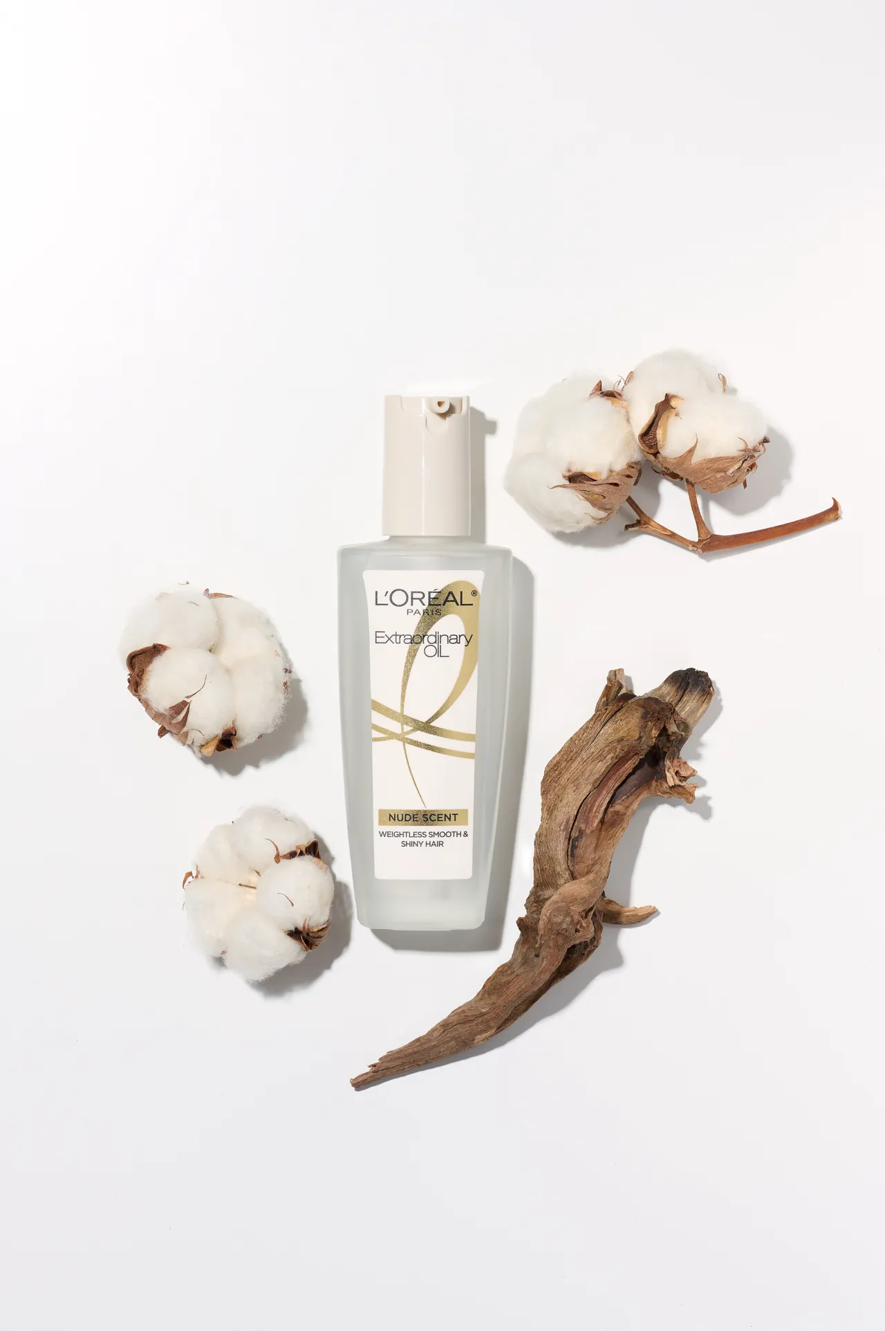 巴黎莱雅金致护发精油暖木裸香，100ml／579元。品牌提供