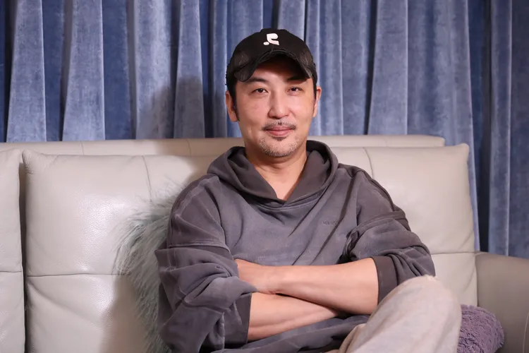 李进良受访猛开前妻小祯玩笑。庄宗达摄