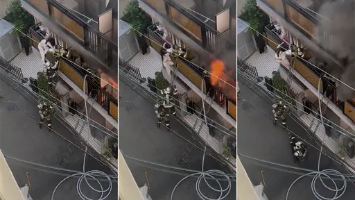 影片｜她受困火警公寓阳台　竟把前来救援的消防员踹下楼