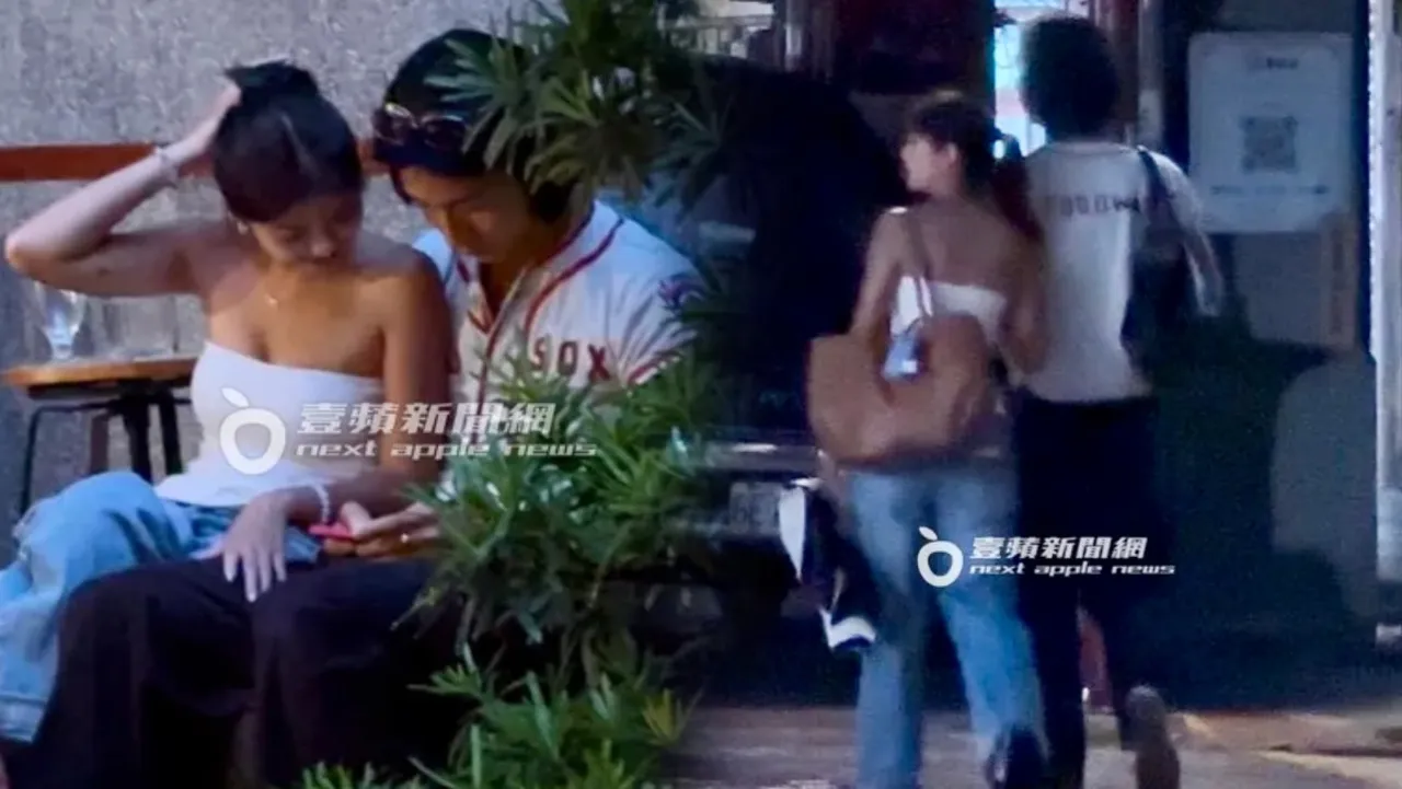 若盈（左）穿低胸马甲，小露香肩美背和酥胸，贴在lan身上摸他大腿一起看手机，之后又勾手漫步迪化街。特勤中心摄