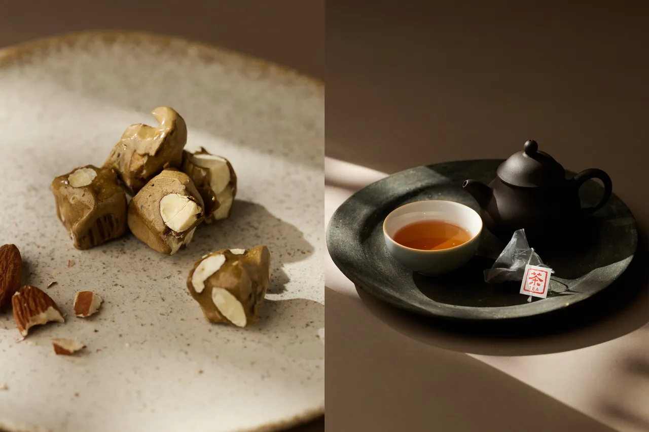 红茶杏仁牛轧糖甜度平衡，搭配回甘的萃酽普洱茶入口，风味清爽。业者提供