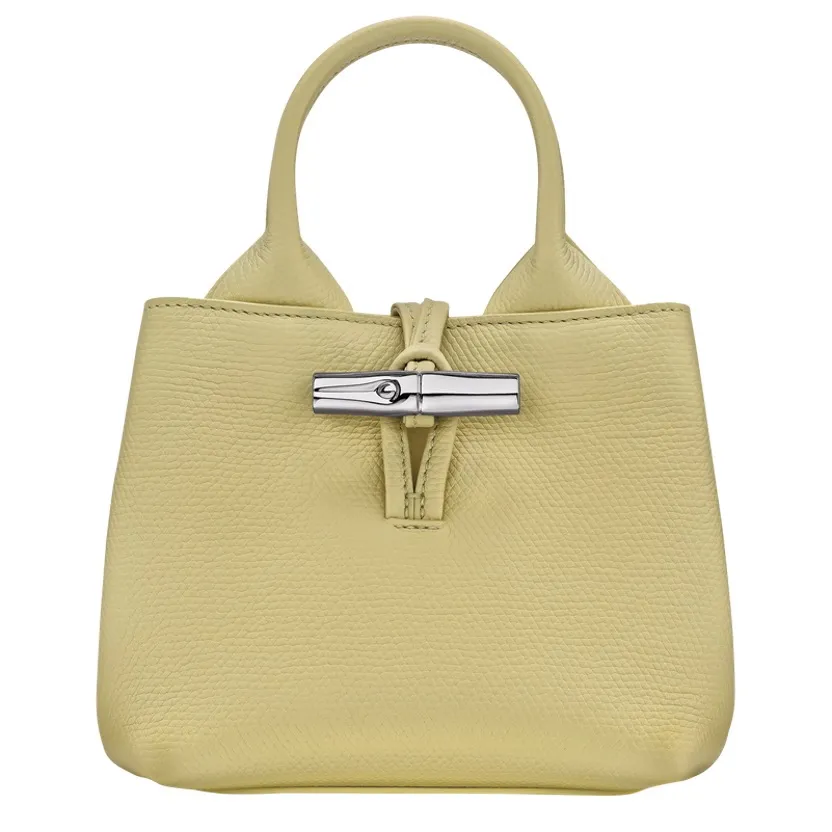 LONGCHAMP Le Roseau系列开心果色手提包，2万3500元。品牌提供