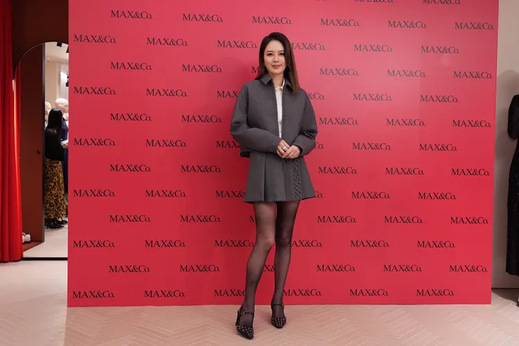 Melody表示自己是「靠腿成家」，今日造型也以短裙曬出修長好比例。彭欣偉攝