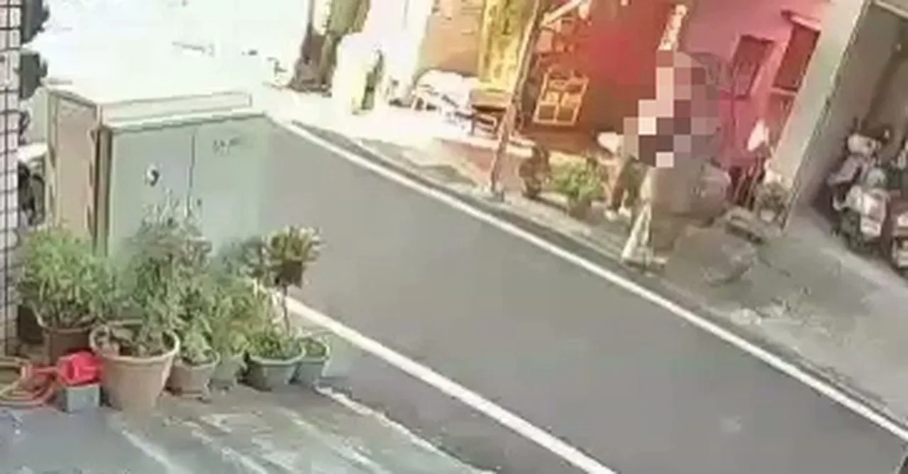 警方调阅监视画面，查出原来是与公庙有纠纷的邻居所为。翻摄画面