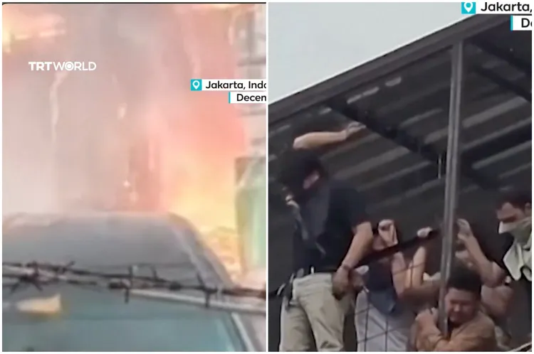 印尼雅加达一栋办公大楼发生火灾，不少人爬到顶楼求生。翻摄X