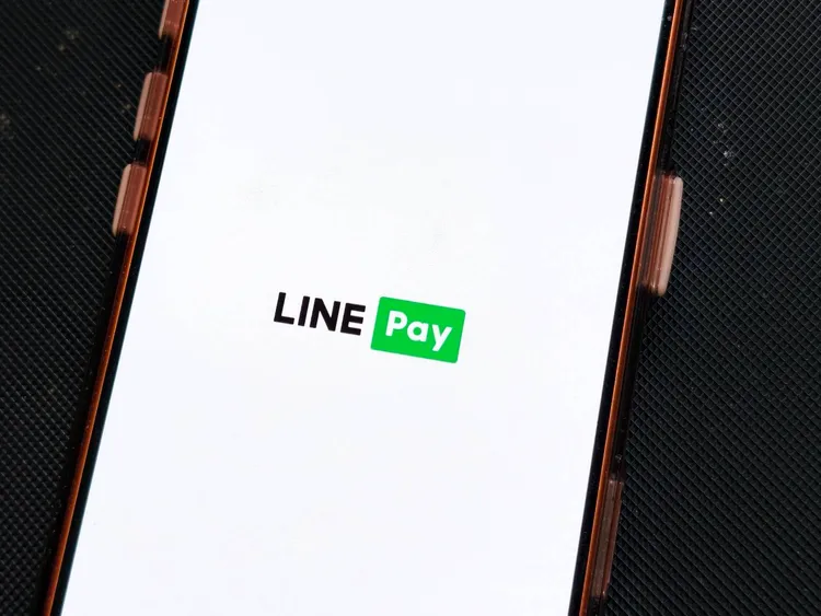 LINE Pay Money上線倒數，疑似湧入更新人潮，App短暫出現首頁卡住情形。趙筱文攝