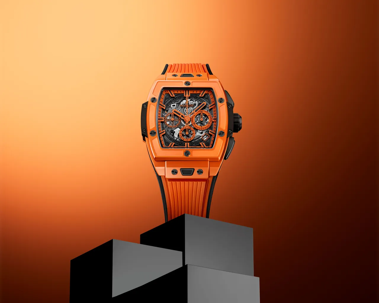 HUBLOT Spirit of Big Bang亮彩橘陶瓷计时码表，42mm，抛光橘陶瓷表壳，蓝宝石水晶镂空表盘，橘色和黑色立体橡胶表带，HUB4700自动上链镂空计时码表机芯，动力储存50小时，防水深100米，限量200只，117万3000元。品牌提供