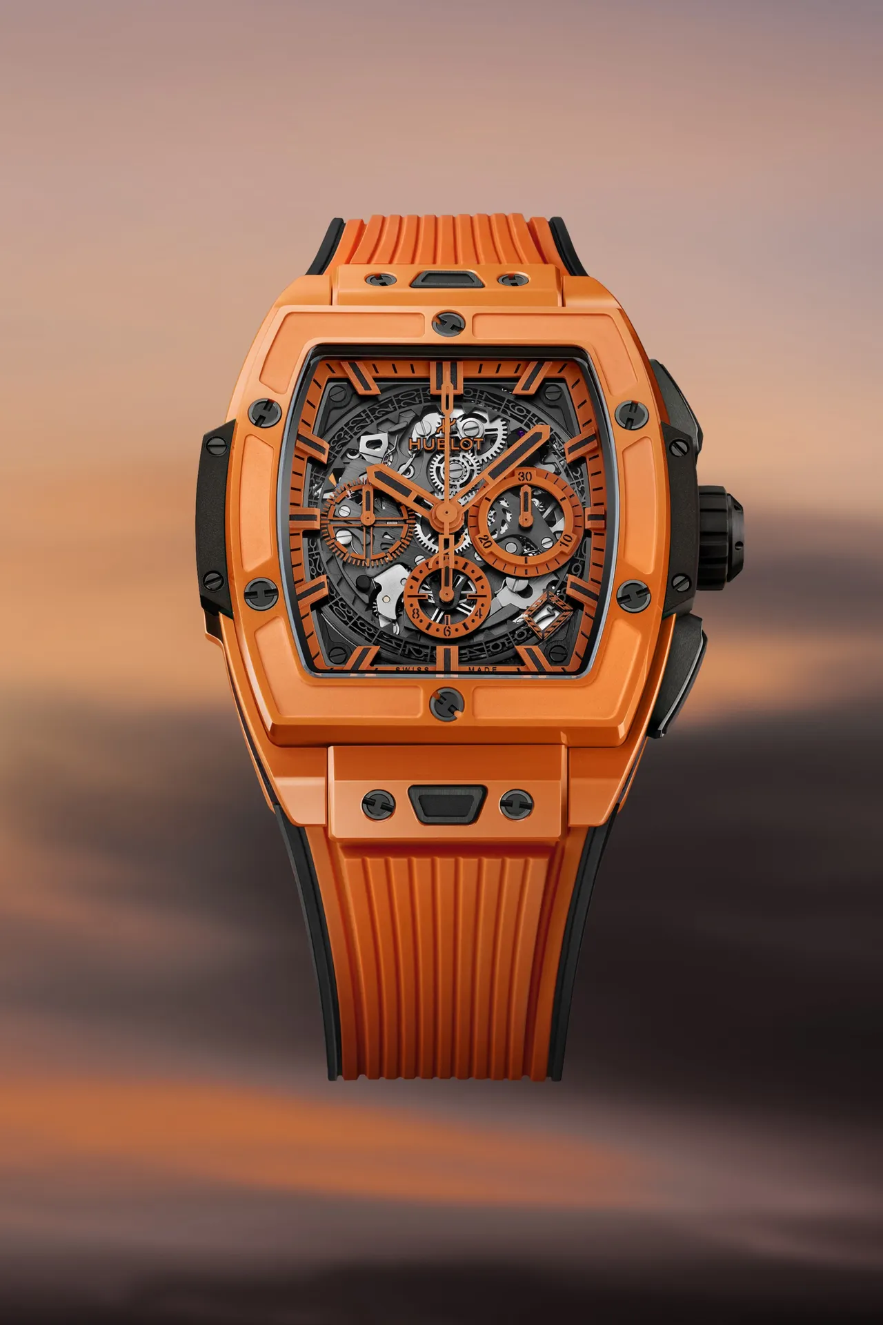 HUBLOT Spirit of Big Bang亮彩橘陶瓷计时码表，42mm，抛光橘陶瓷表壳，蓝宝石水晶镂空表盘，橘色和黑色立体橡胶表带，HUB4700自动上链镂空计时码表机芯，动力储存50小时，防水深100米，限量200只，117万3000元。品牌提供