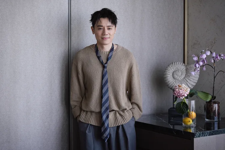 邱志宇談起打工的甘苦。彭欣偉攝