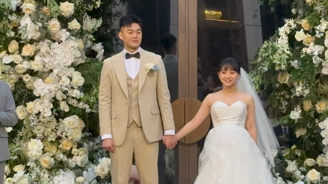 王齐麟（左）与陈诗媛今天举办婚宴。特勤中心摄