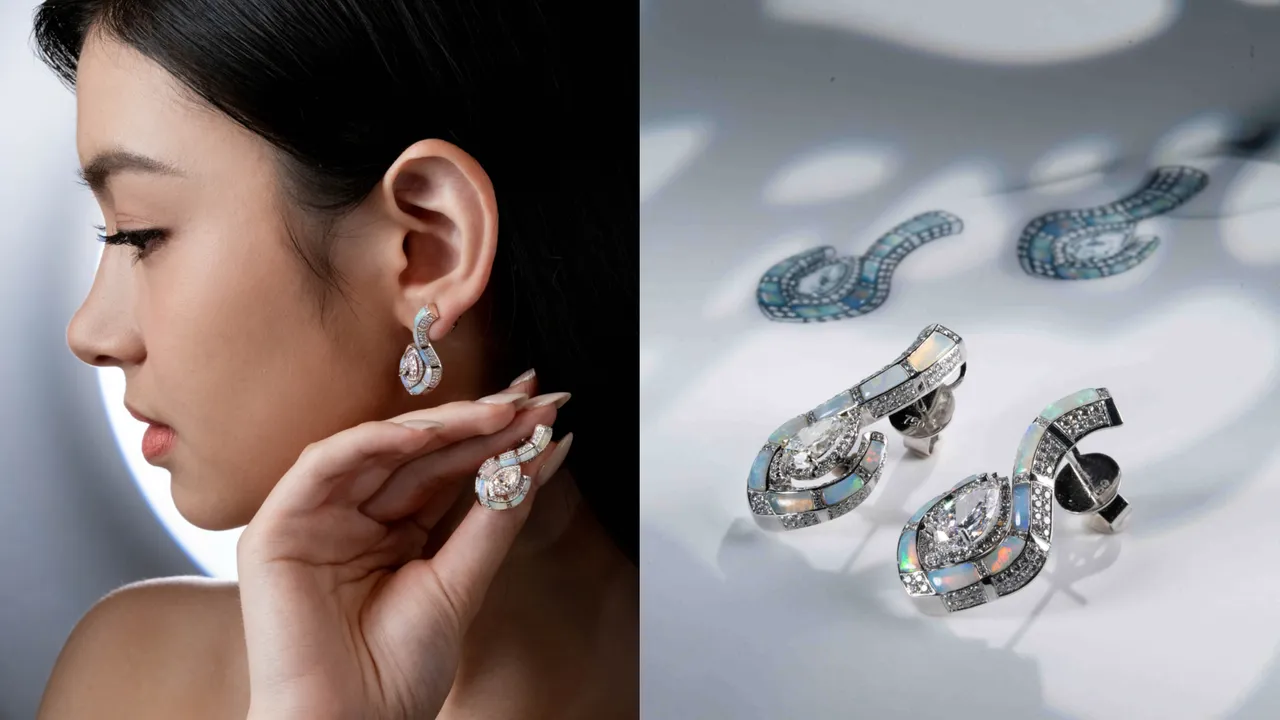 蛋白石钻石耳环（水滴形钻石2颗各 1.02克拉＆1.07克拉、蛋白石共13.68克拉、圆钻共1.31克拉、18K白金）。品牌提供