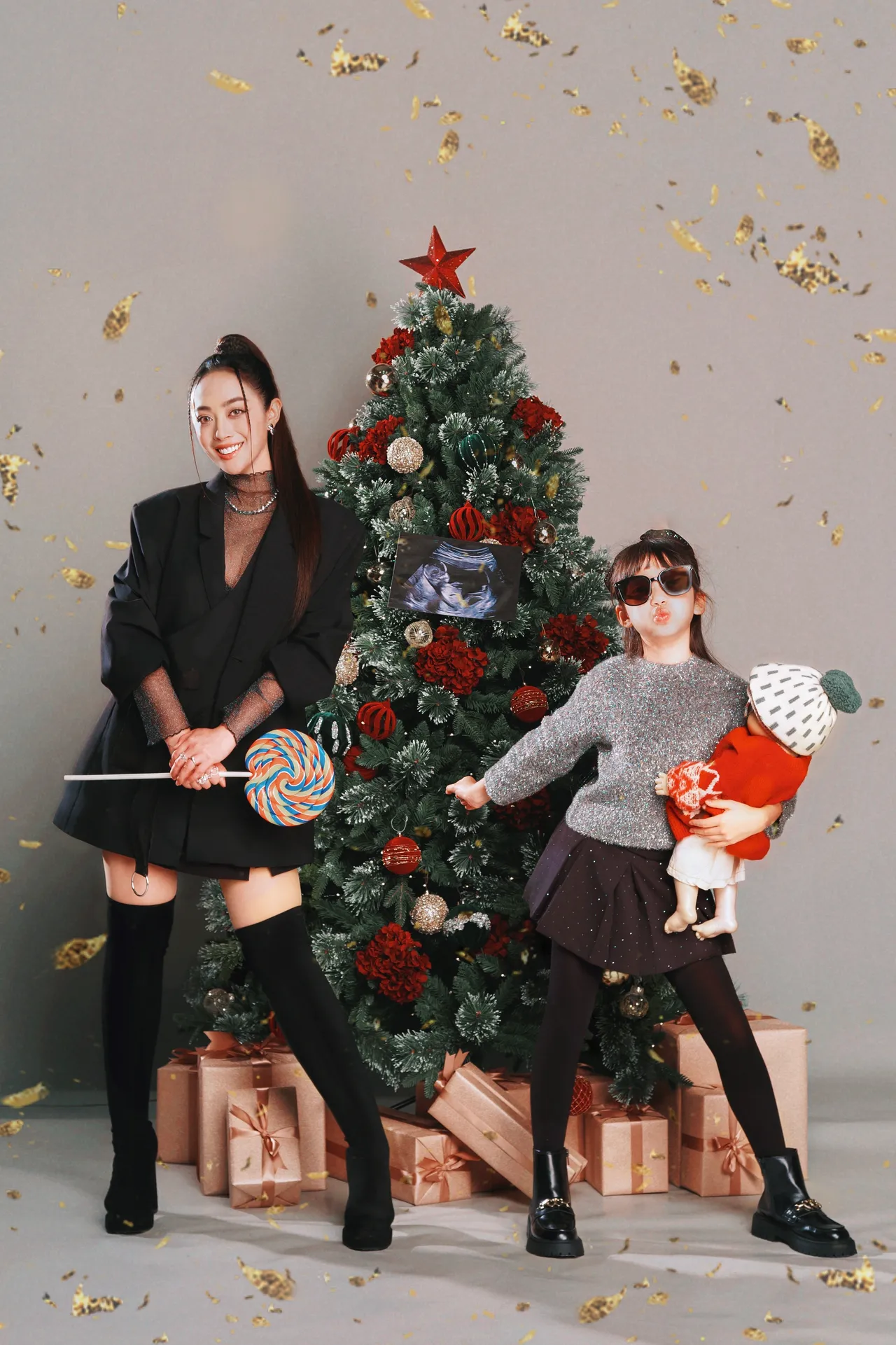 舞思爱（左）实现9岁爱女想当姊姊的愿望。爱玩音乐提供