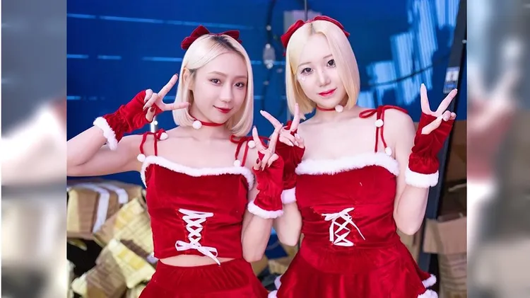 啦啦队卉妮（左）与朴星垠（右），在桃园云豹飞将排球队主场合体如双胞胎。影响力动能提供