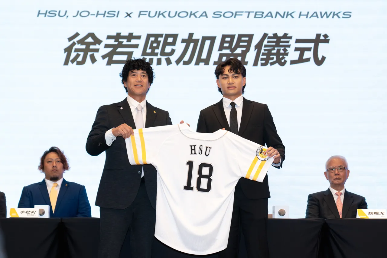 城島健司與徐若熙。  展逸提供