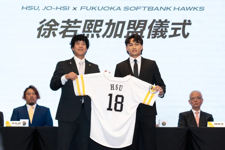 城島健司與徐若熙。  展逸提供