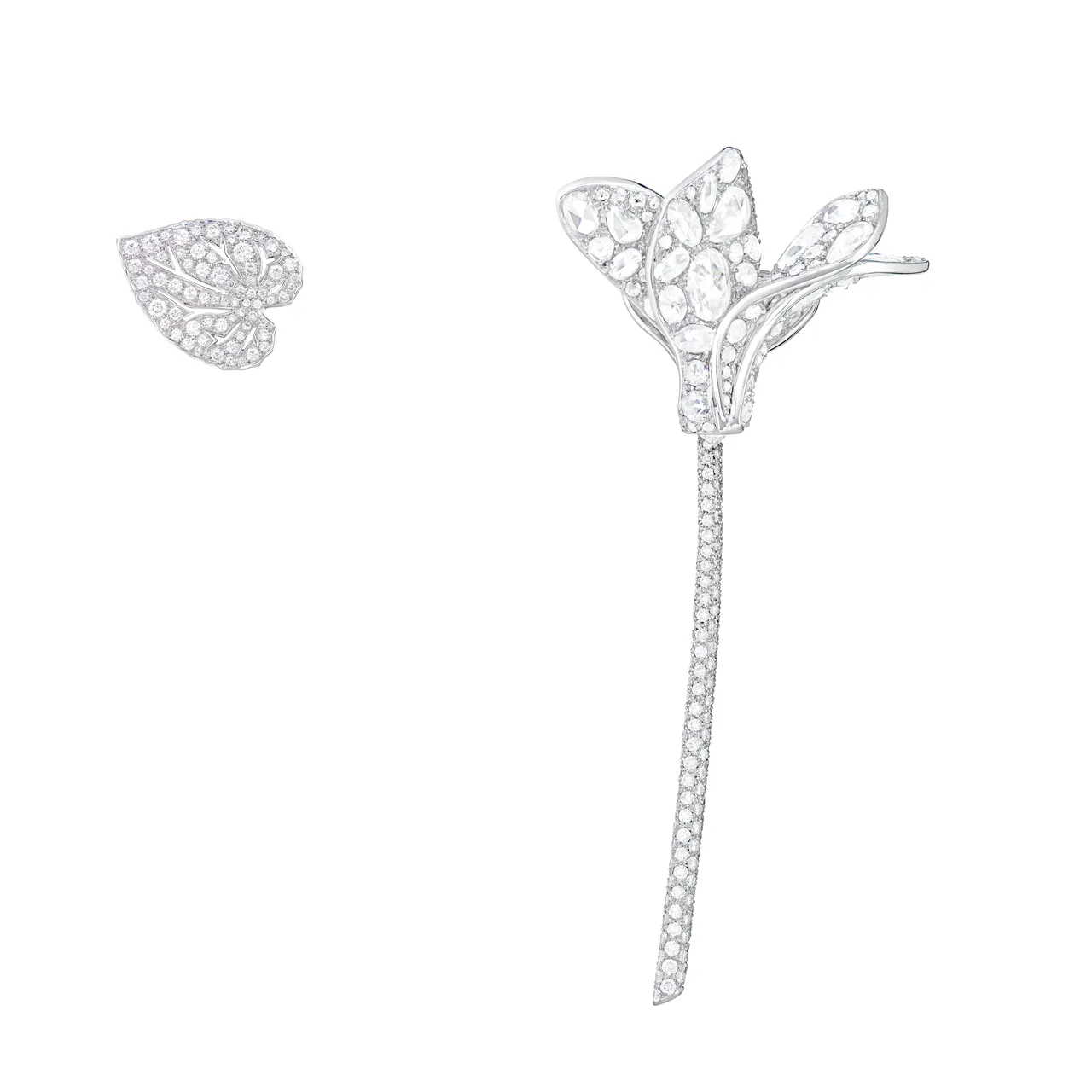 許光漢將BOUCHERON高級珠寶系列Cyclamen仙客來耳環當作胸針配戴。品牌提供