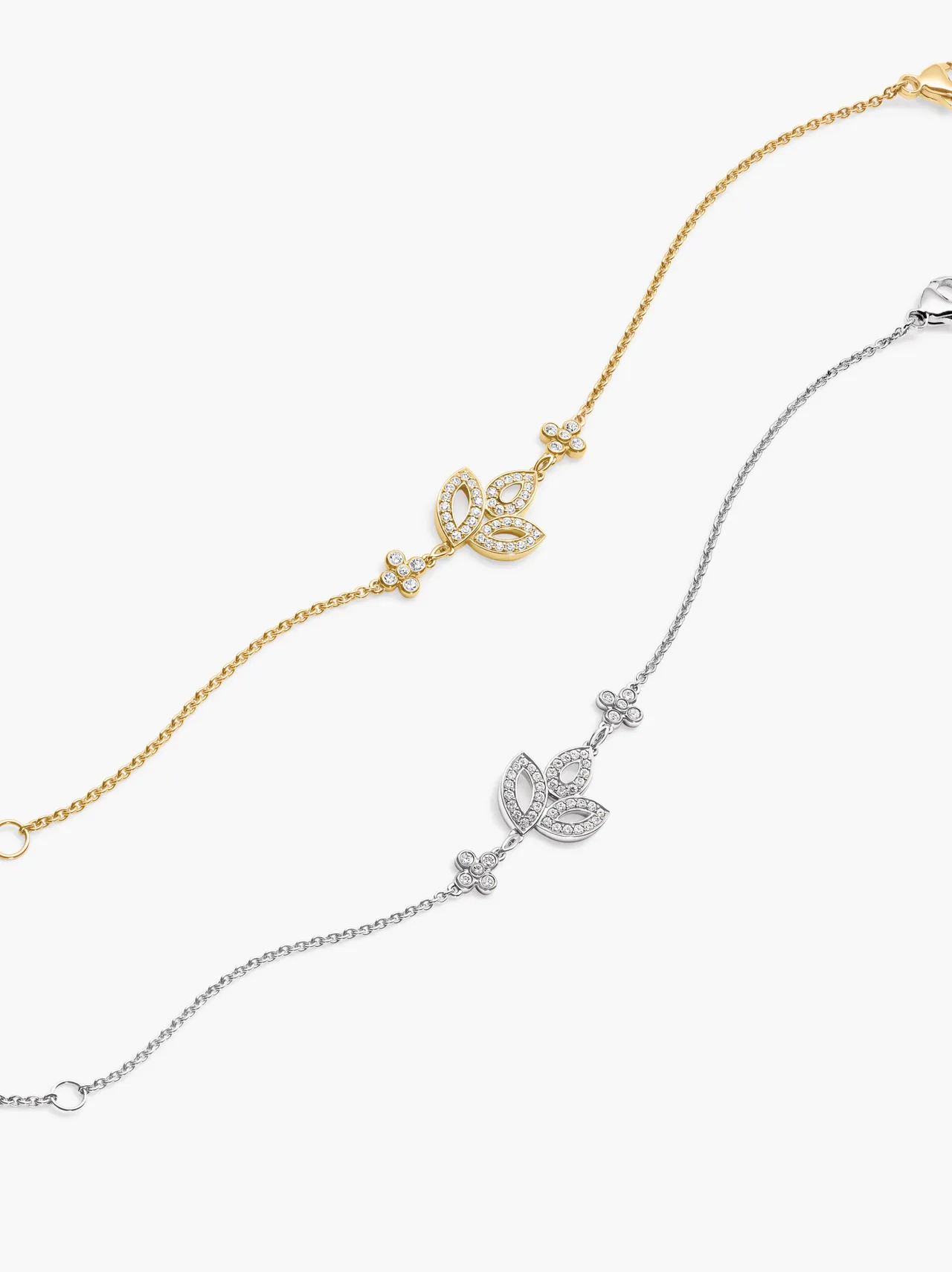 海瑞温斯顿Lily Cluster系列小型铂金钻石手链及小型18K黄金钻石手链。品牌提供