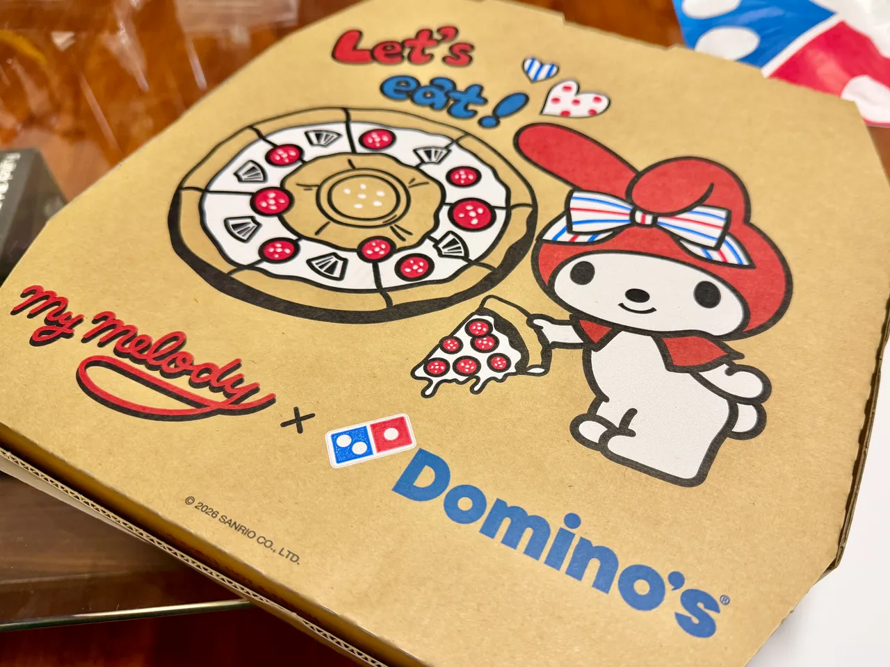 即日起至2月22订购任一大披萨或联名套餐，就能拿到限量款美乐蒂披萨盒。庄伟祺摄