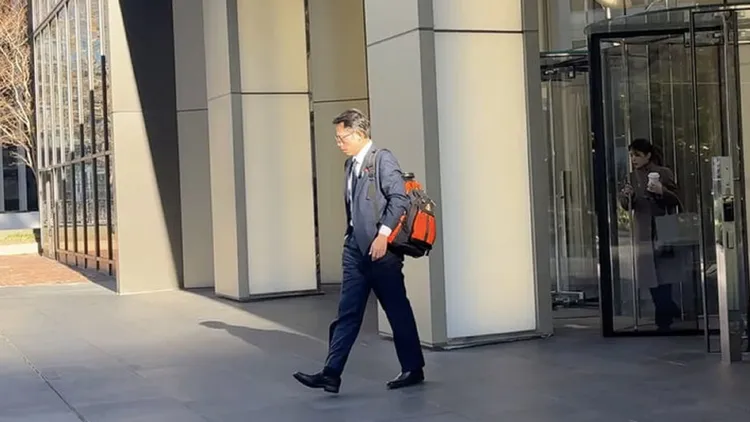 台灣民眾黨主席黃國昌12日率團訪問華府，接連拜會白宮國安會與AIT華盛頓總部。圖為黃國昌步出AIT總部大樓。中央社