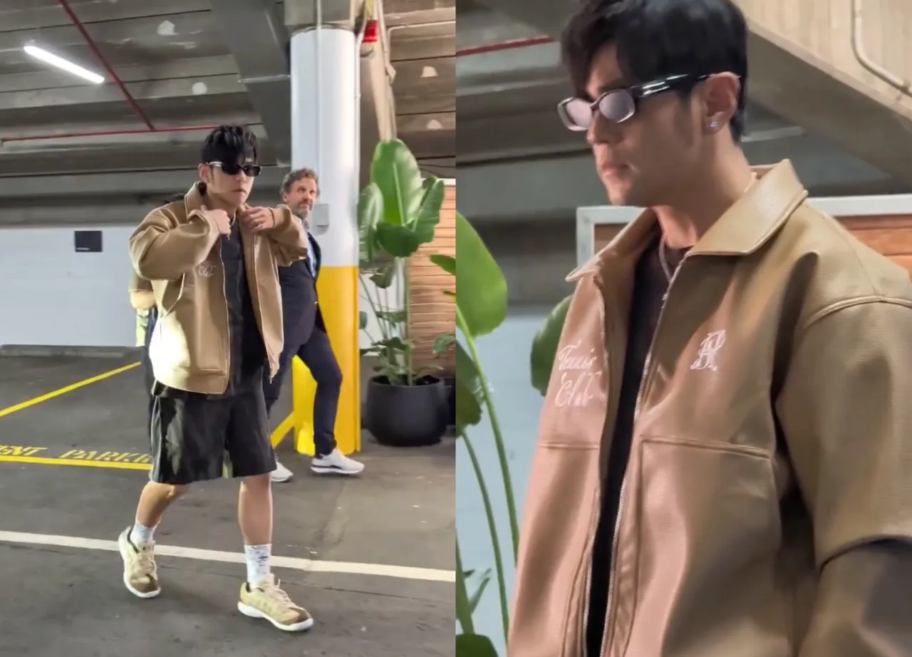 周杰倫套上自家潮牌「PHANTACi TENNIS CLUB」網球系列棕色皮衣。翻攝澳網IG