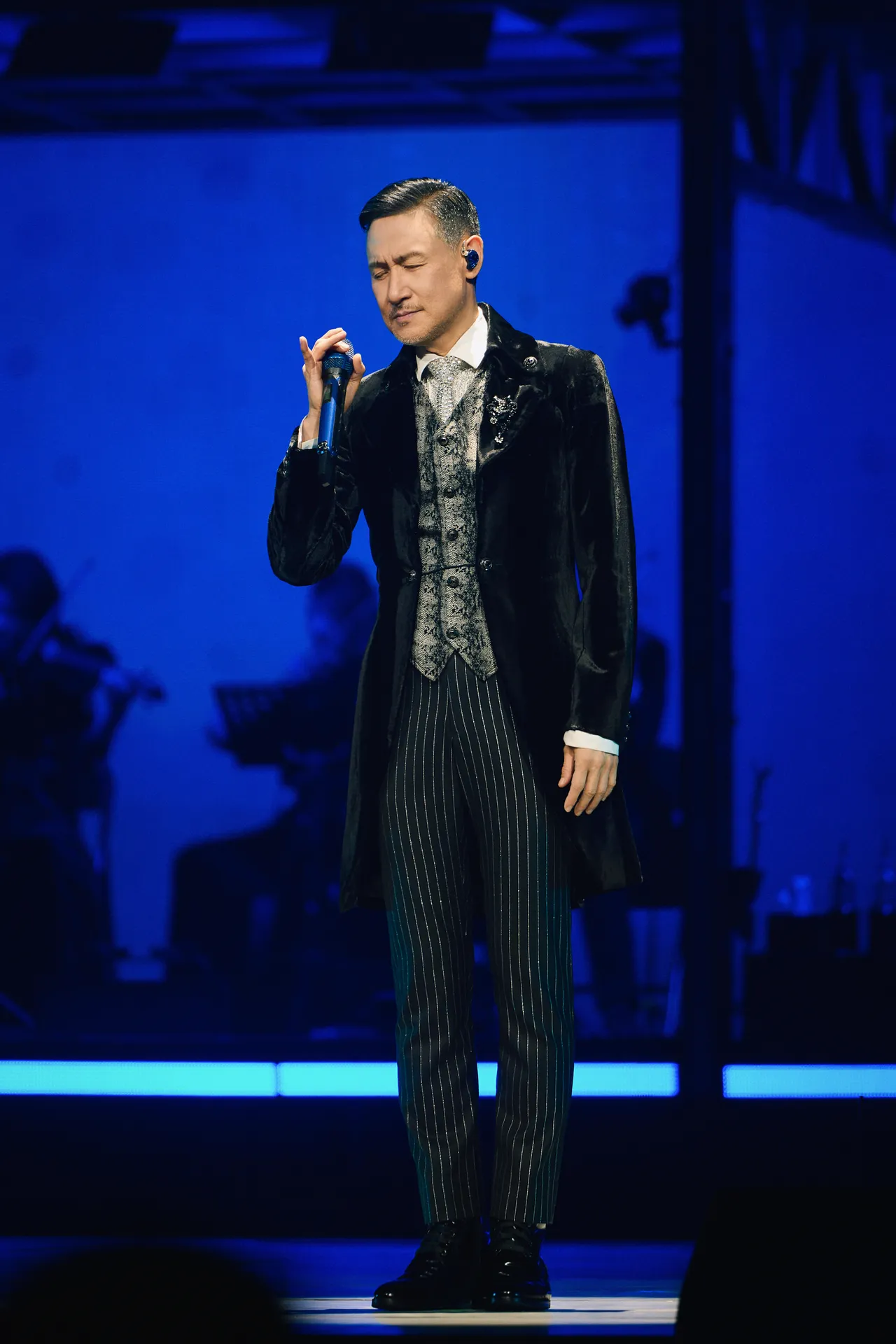 張學友演唱時全神貫注。環球音樂提供